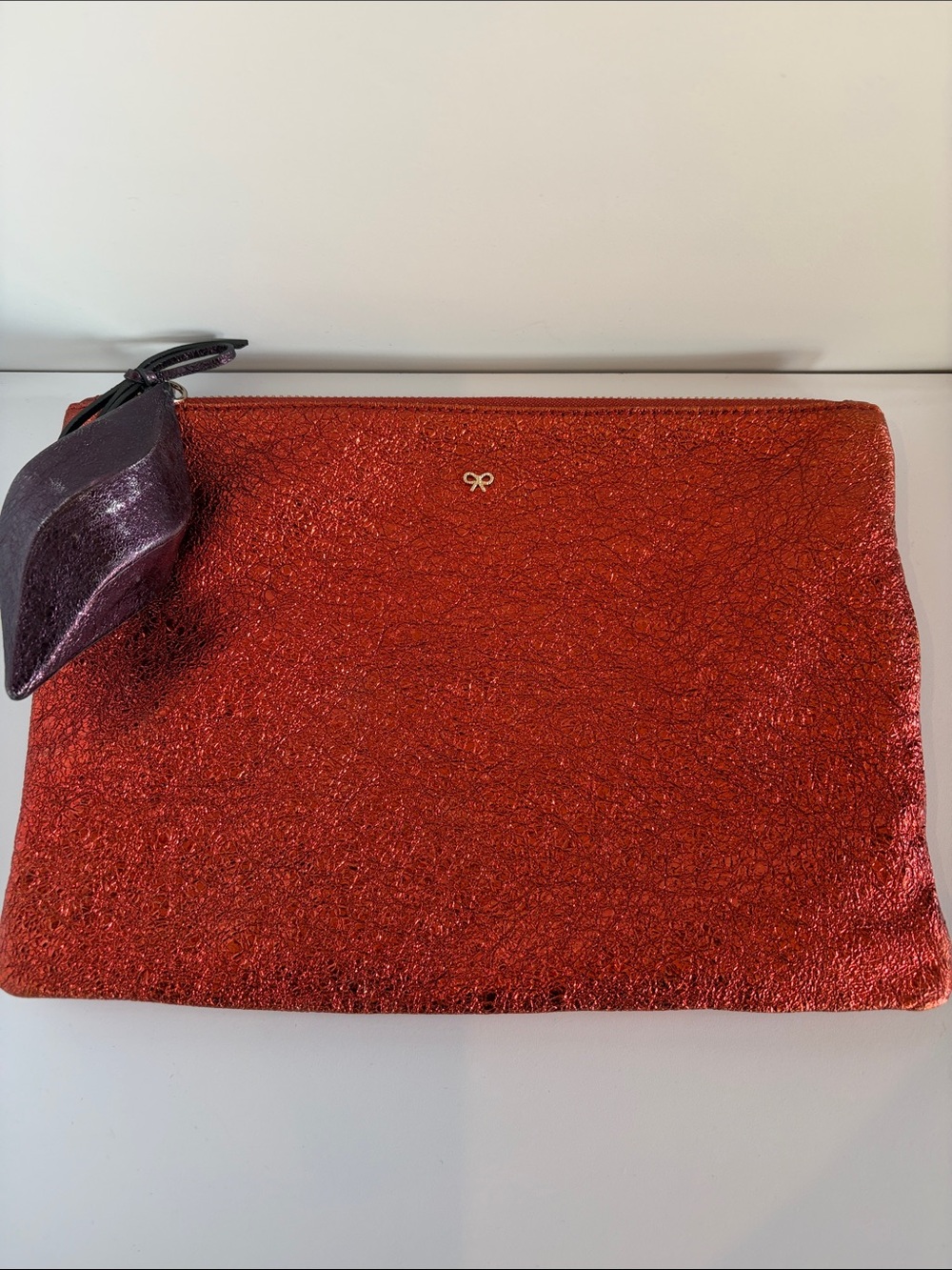 Anya Hindmarch Bits and Bobs Metallic Red Zip Pouch with Purple Tag